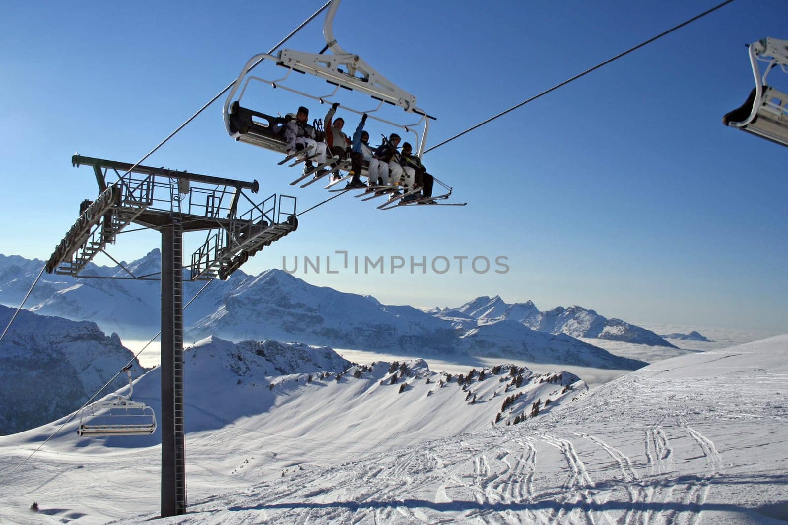 a group of skiers in the sky