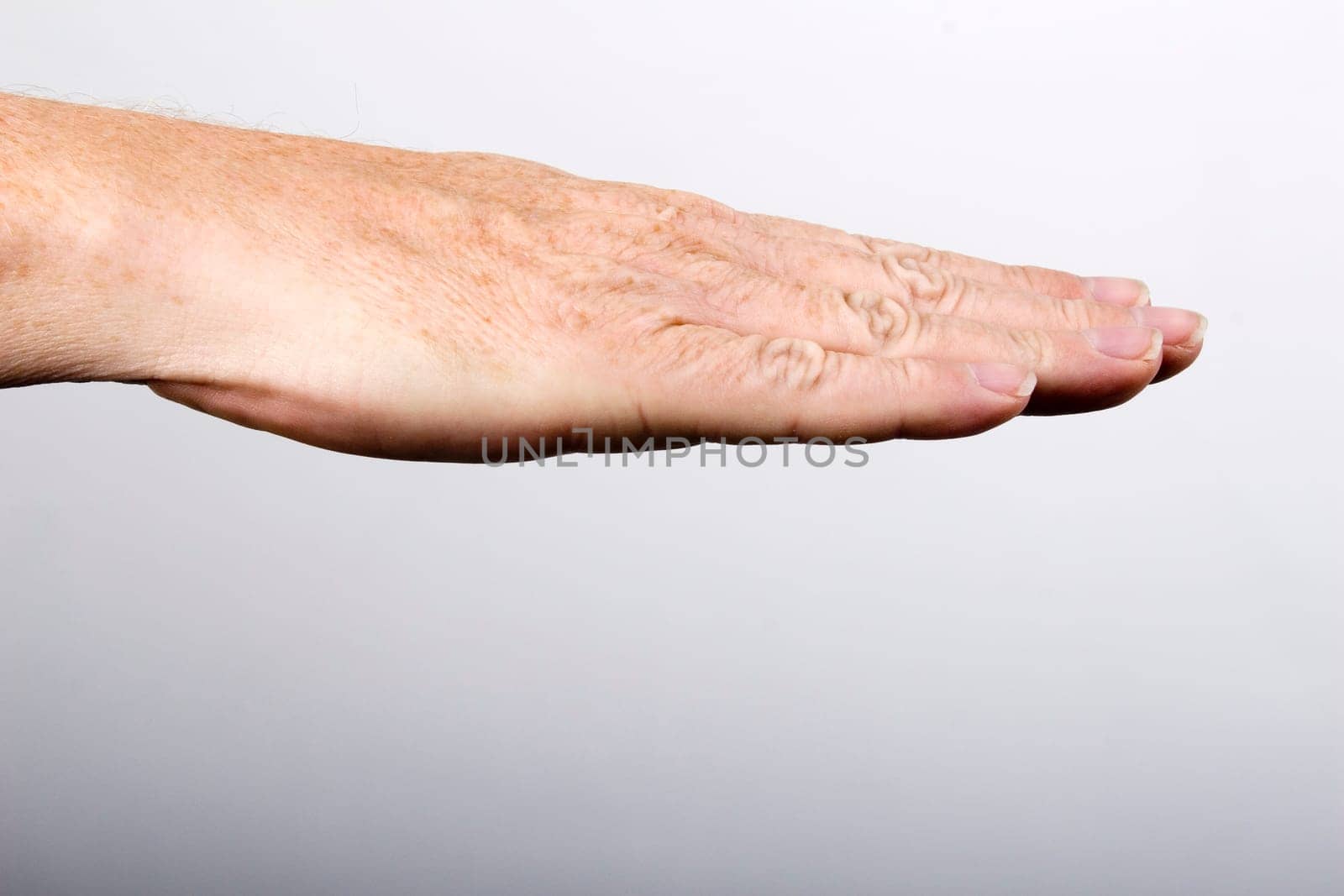 Flat hand on the right