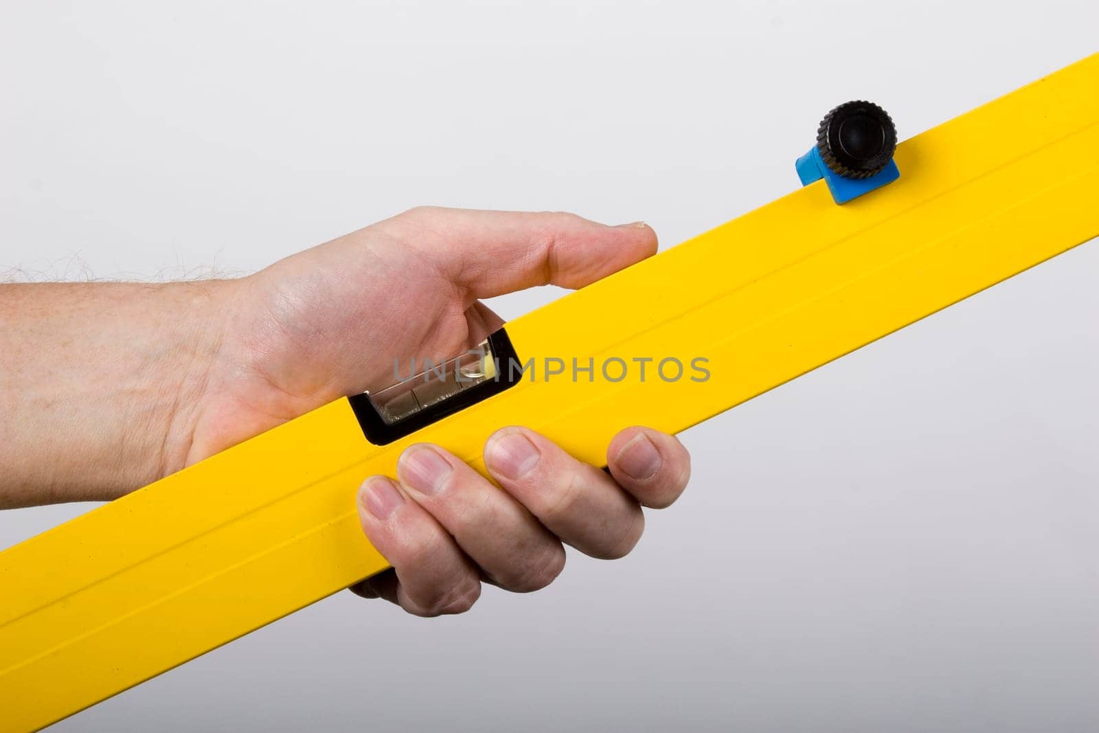 Hand with spirit level