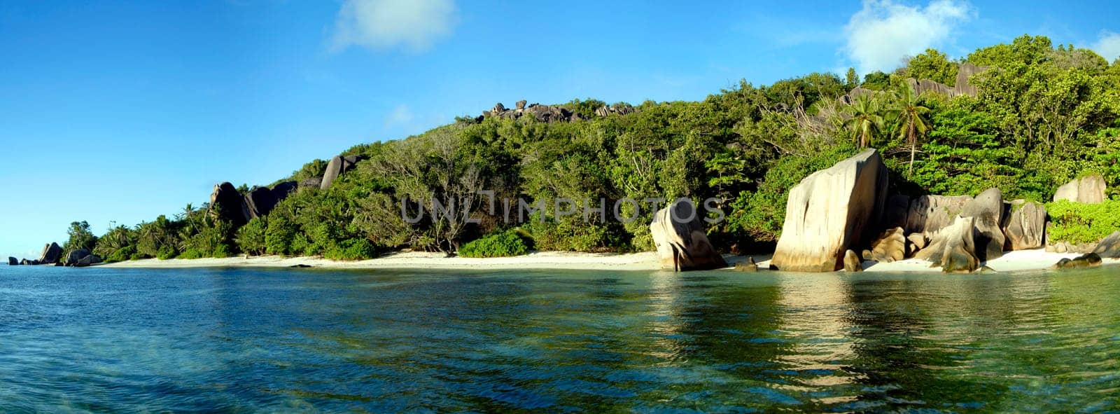 The image is composed of six portrait images and shows Anse Source d'Argent on La Digue in the Seychelles.