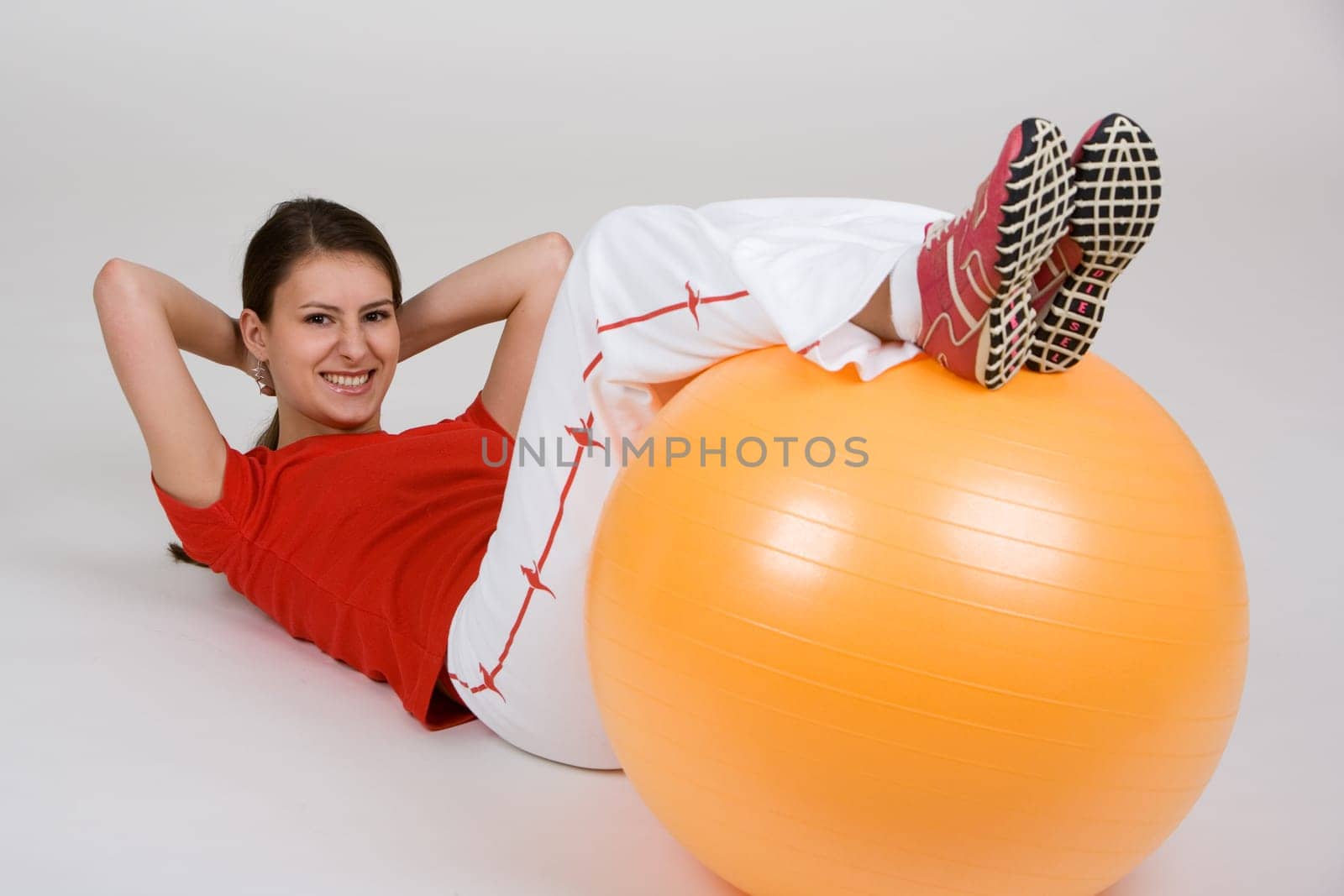 Young woman with exercise ball 5