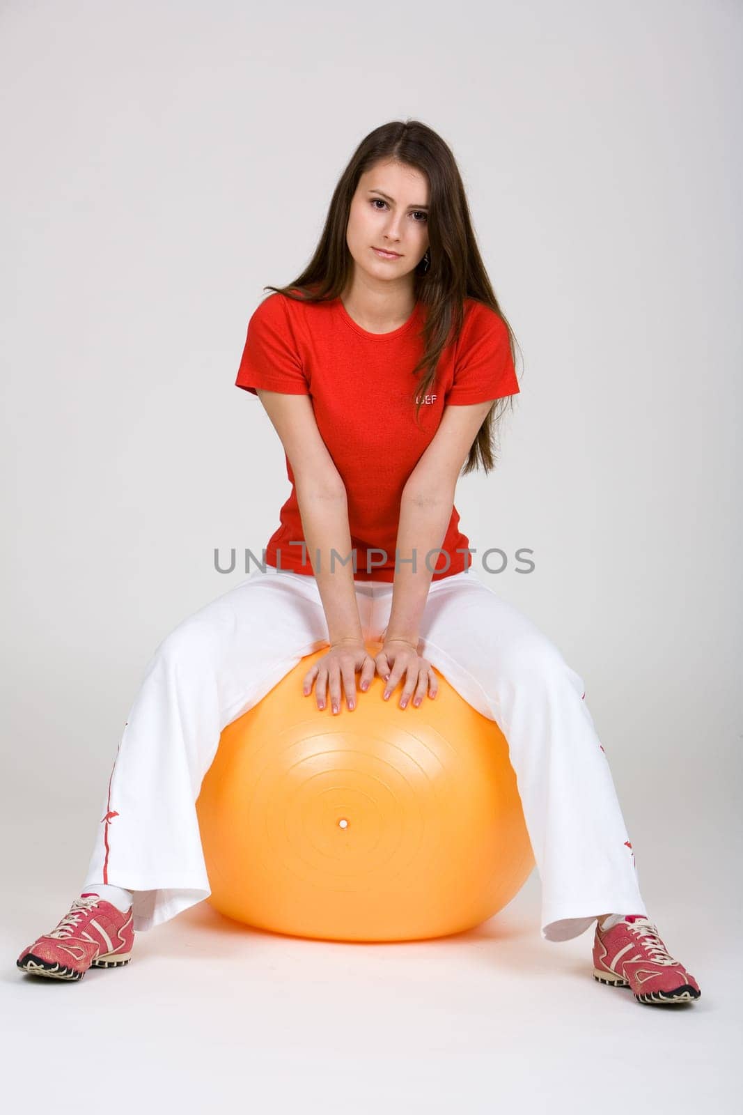 Young woman with exercise ball 1
