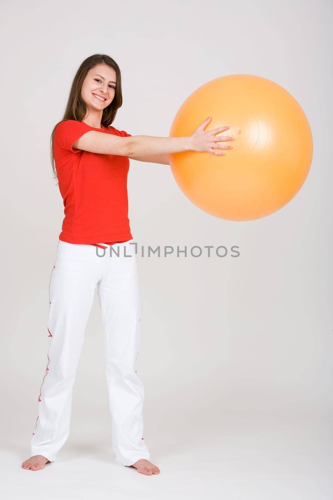 Young woman with exercise ball 9