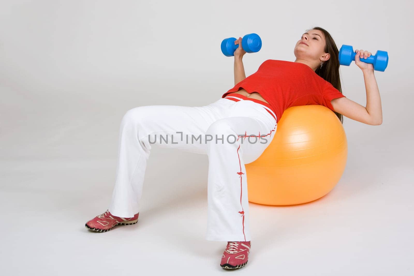 Young woman with exercise ball 6