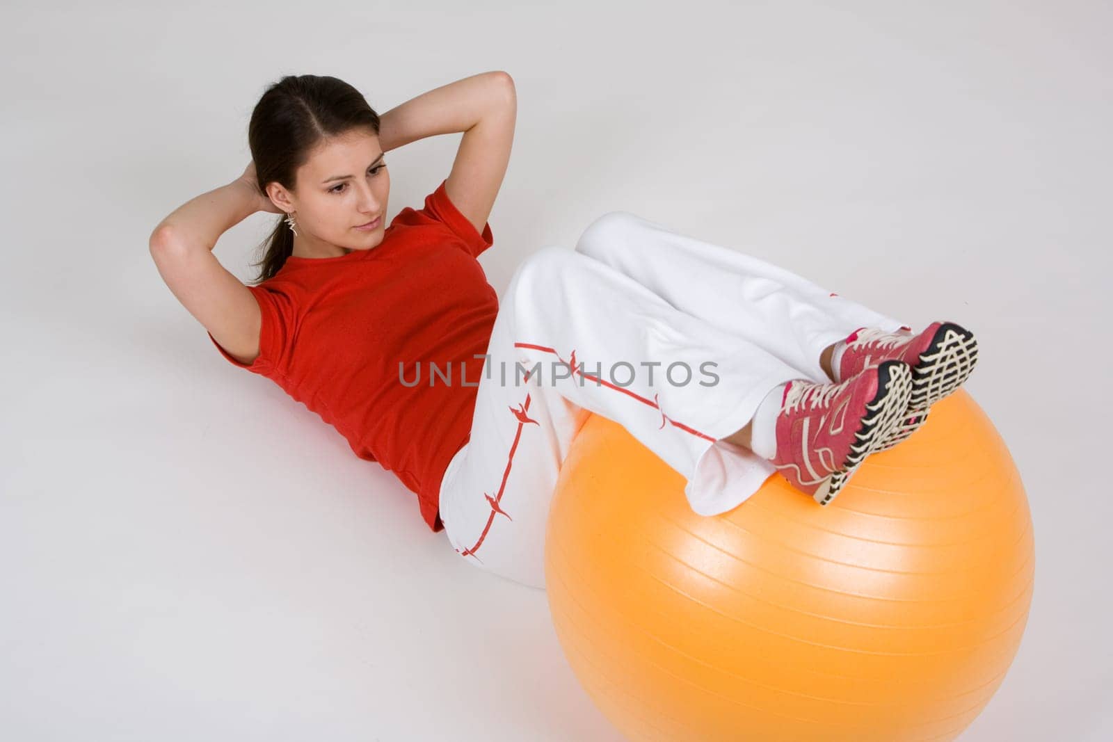 Young woman with exercise ball 4