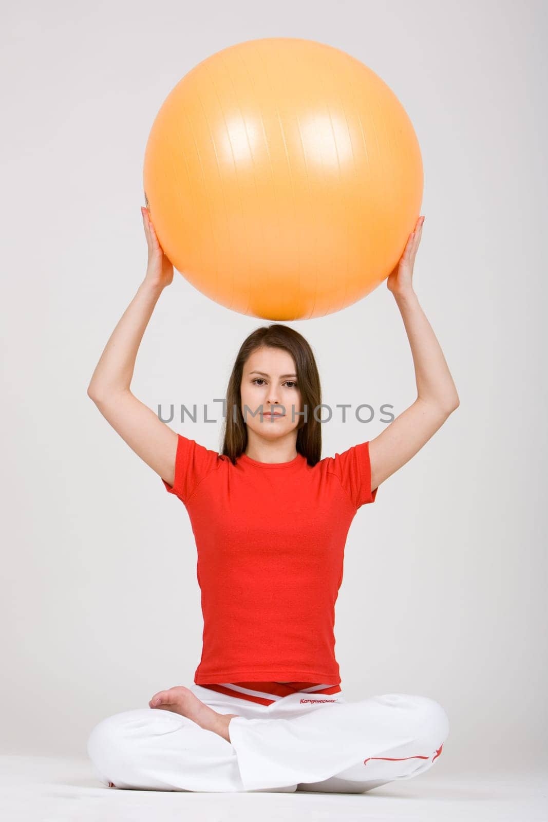 Young woman with exercise ball 8