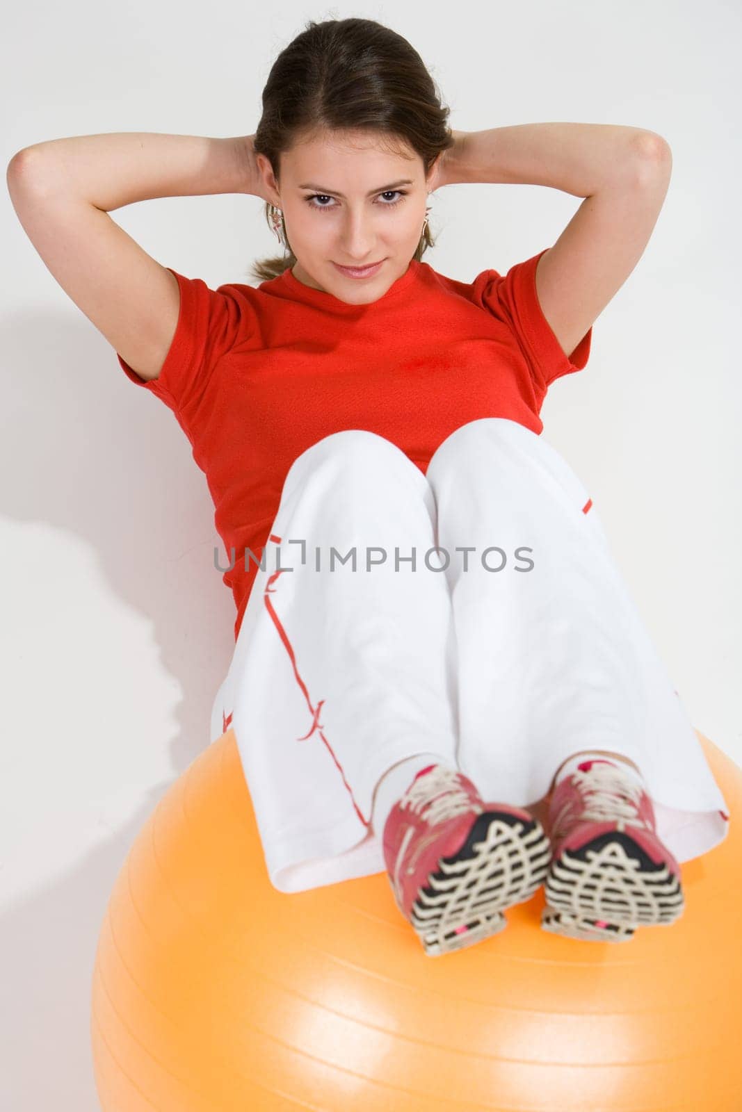 Young woman with exercise ball 3