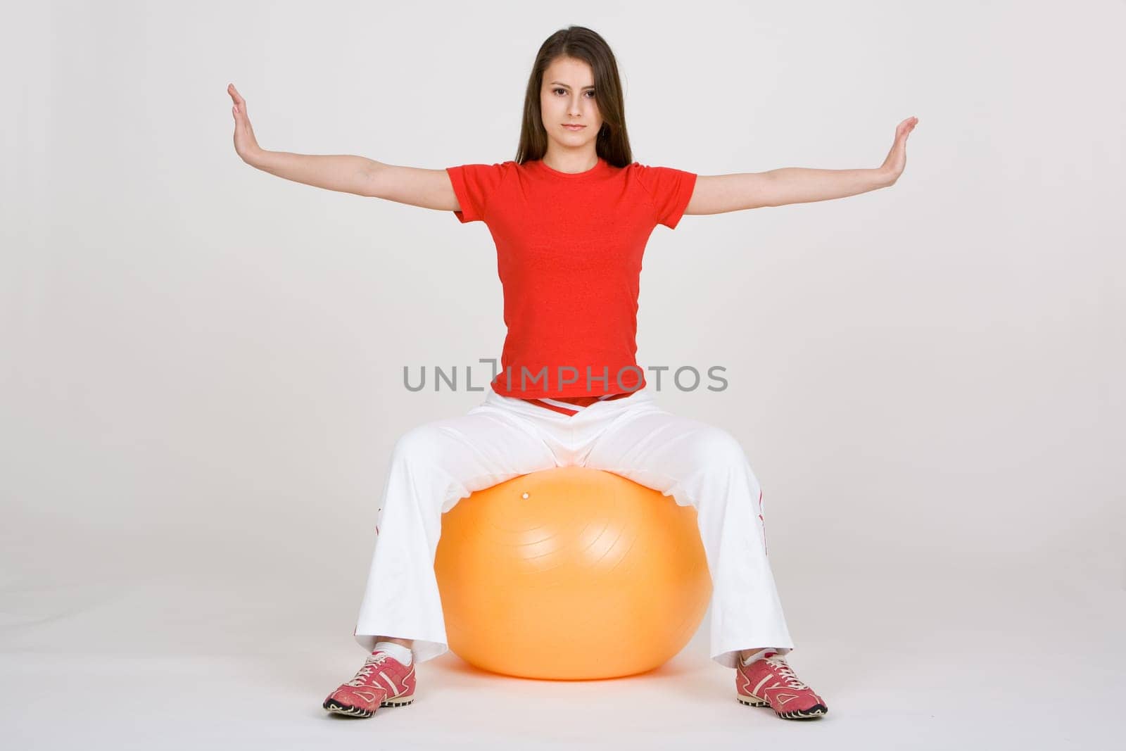 Young woman with exercise ball 7