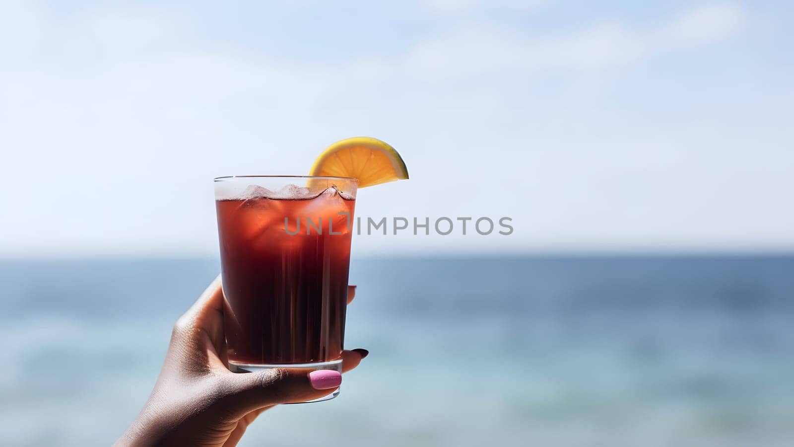 african american hand holding glass of cocktail on blurry sea horizon background at sunny day, neural network generated image by z1b