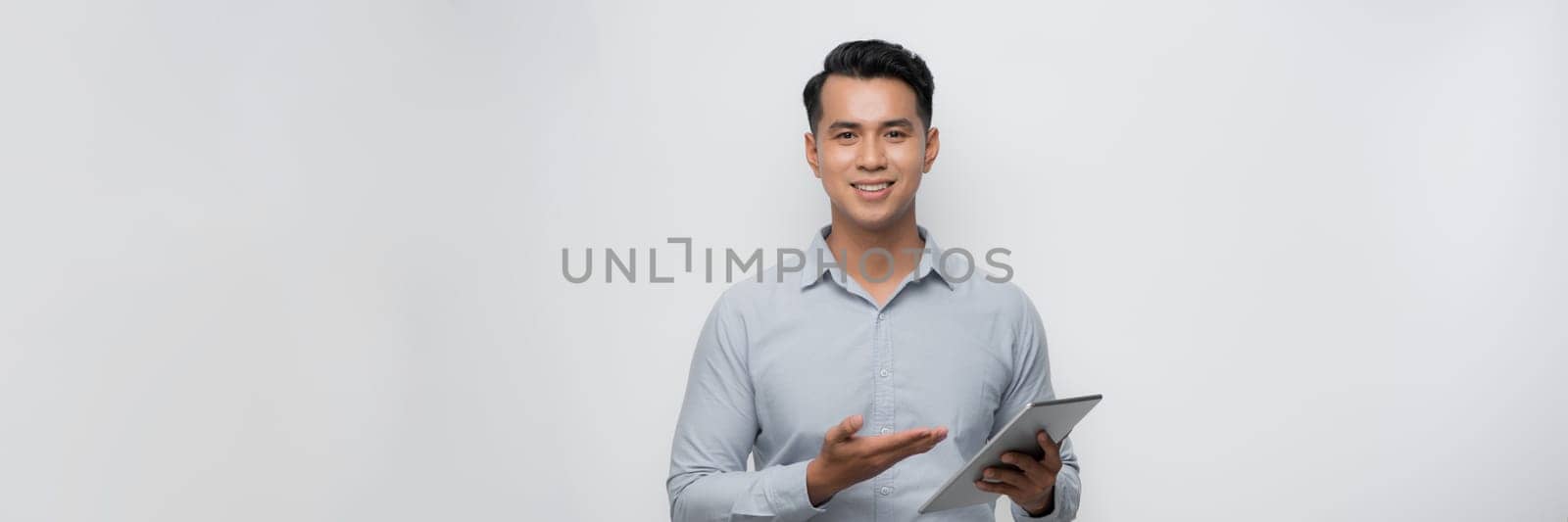  Asian man Pointing at the phone screen is blank on white background