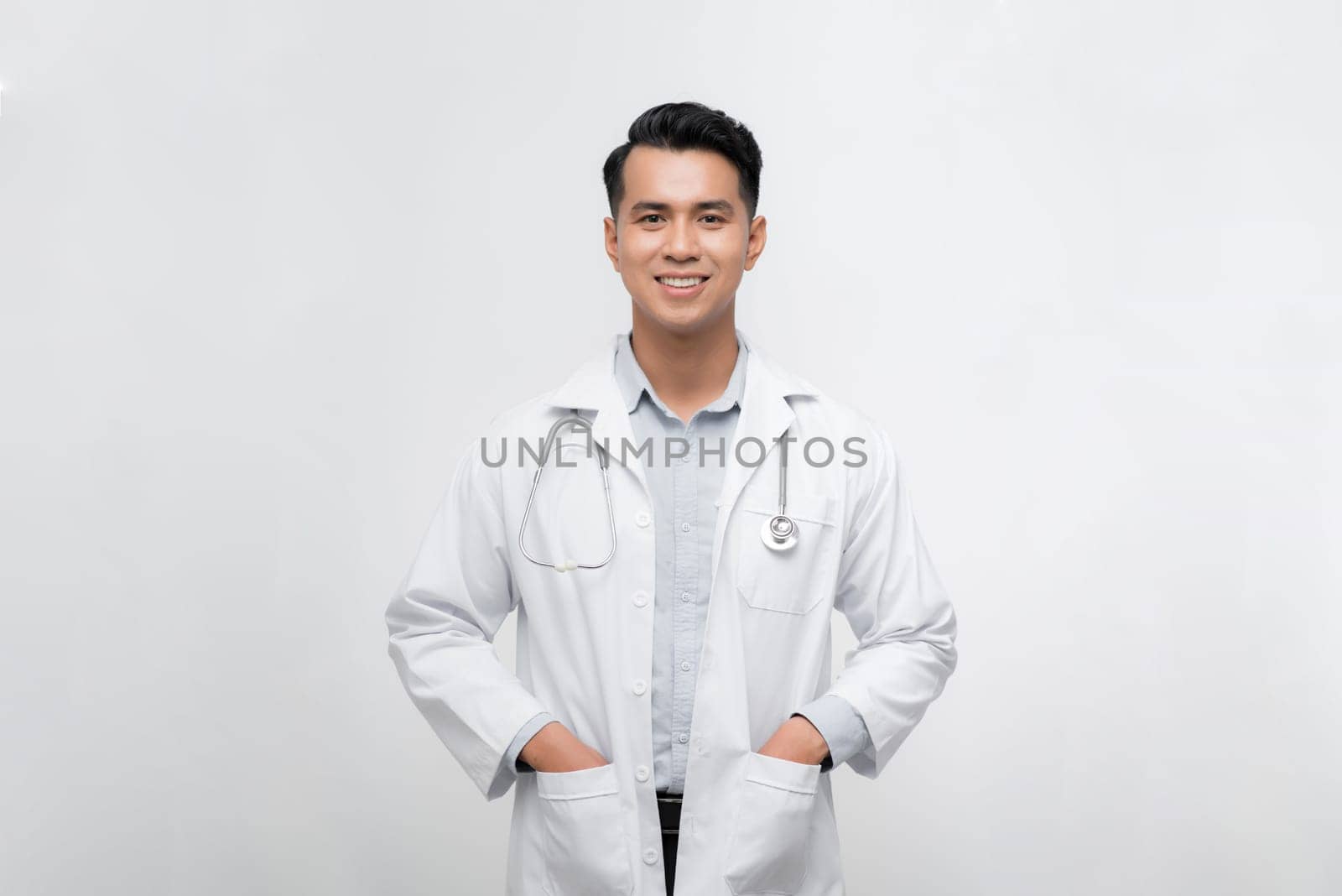  Young and confident male doctor portrait. Successful doctor career concept. by makidotvn