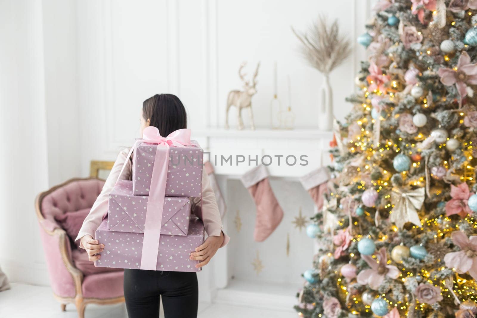 Happy little smiling girl with christmas gift box. by Andelov13