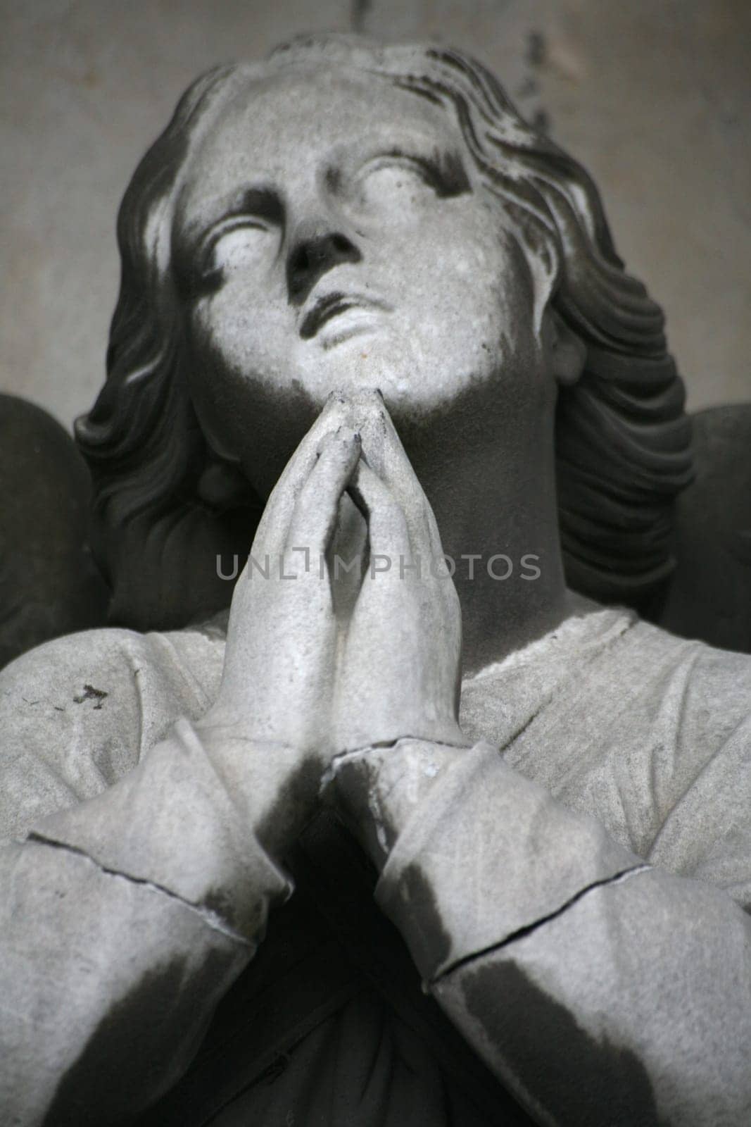 Angel figure on an old grave