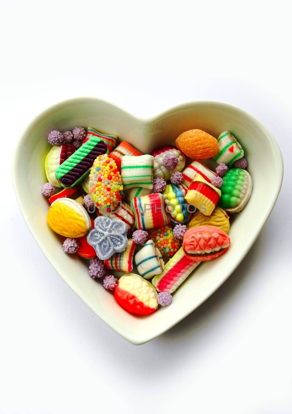 Sweets in a bowl of hearts