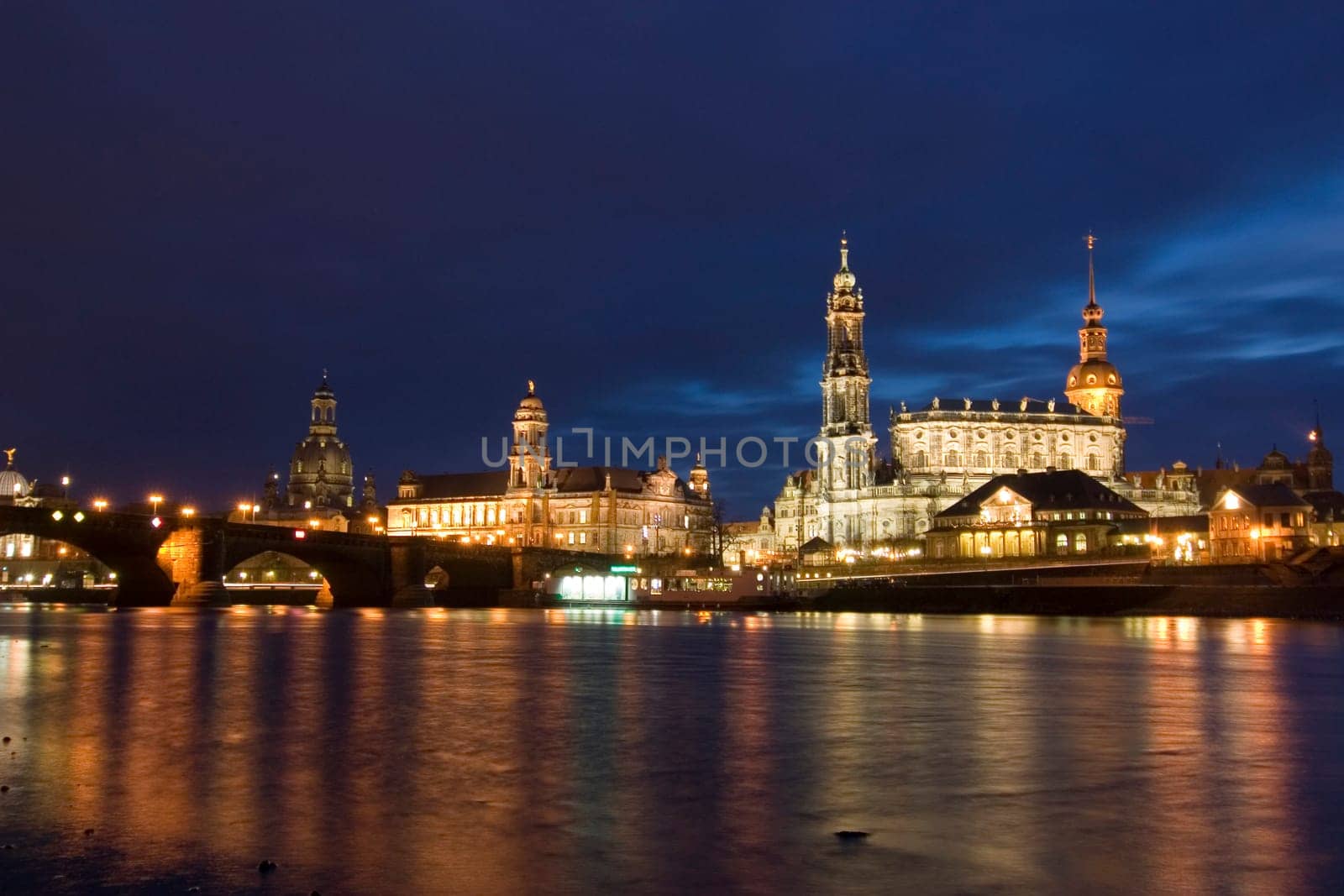 Dresden - View at the blue hour of Augustus Bridge,Higher Regional Court,Hofkirche,Residenzschloss alte Wache and Theaterkahn