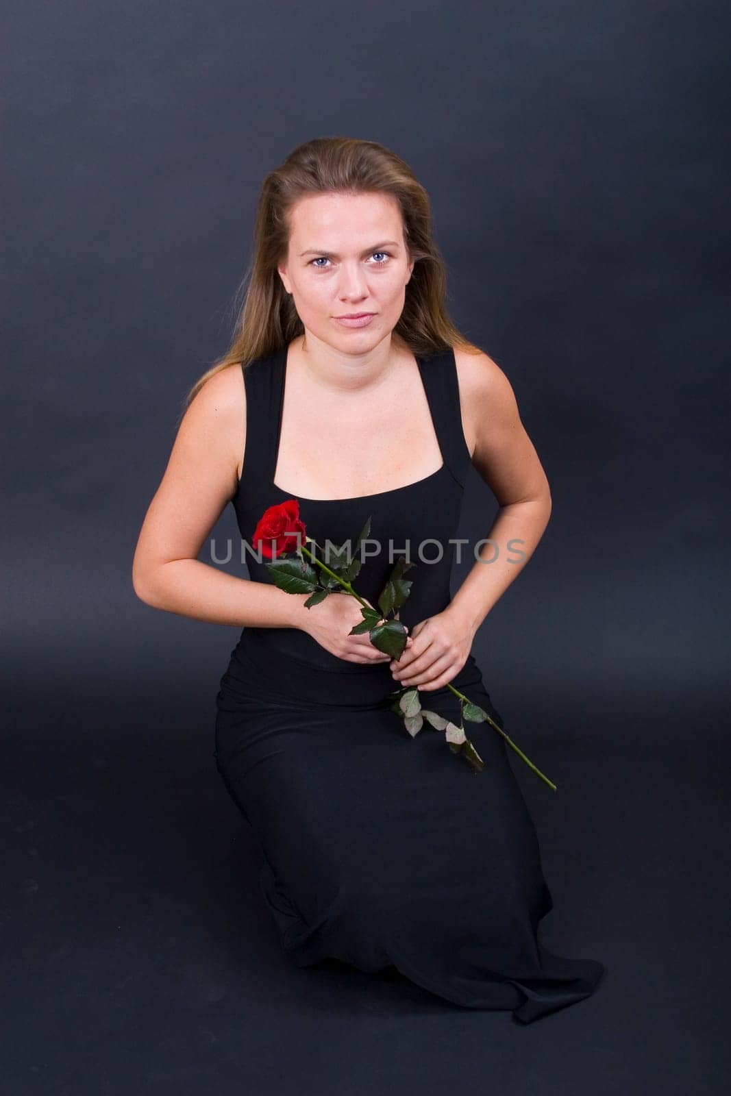 Miryam kneeling with Rose