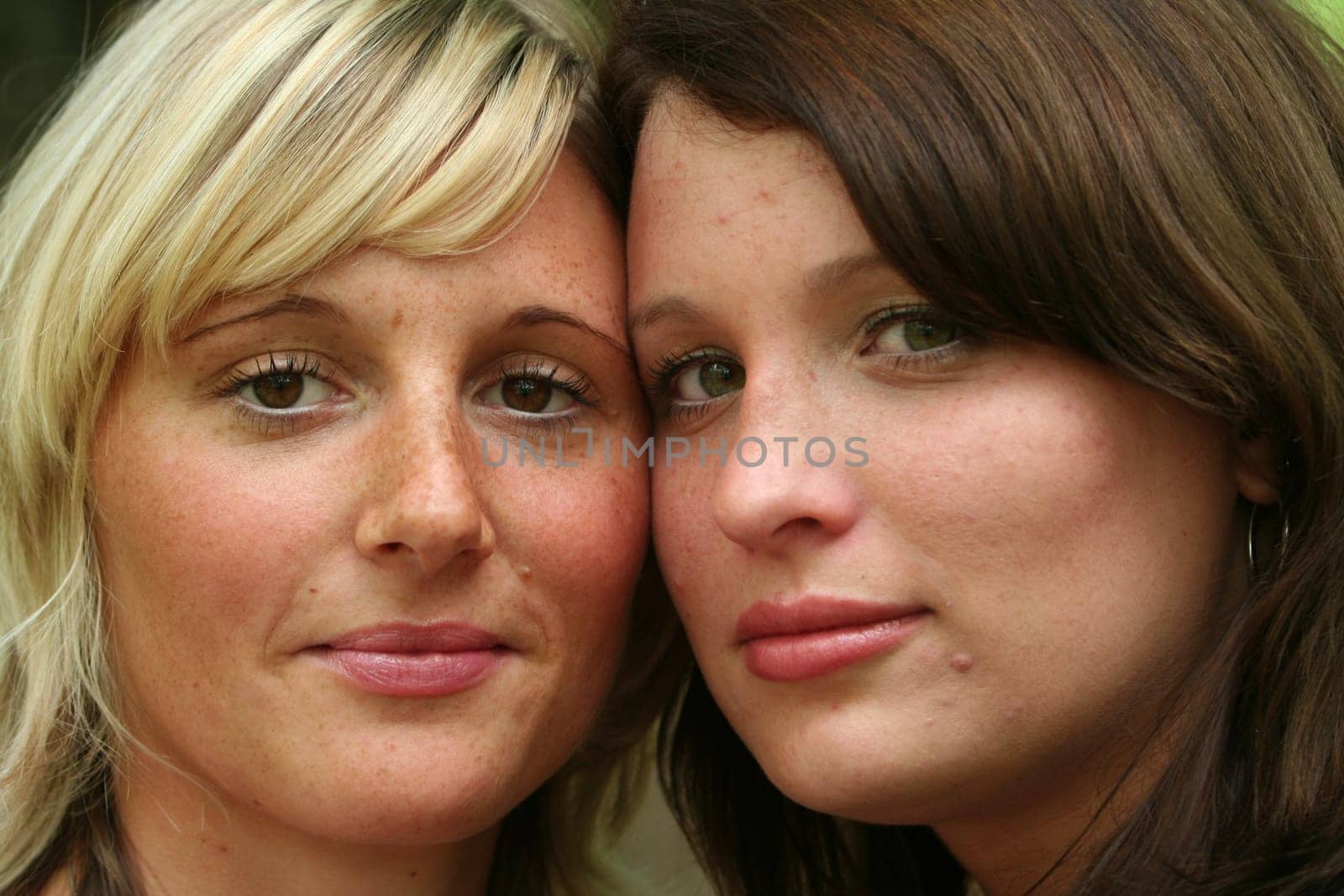 two cheerful young girlfriends