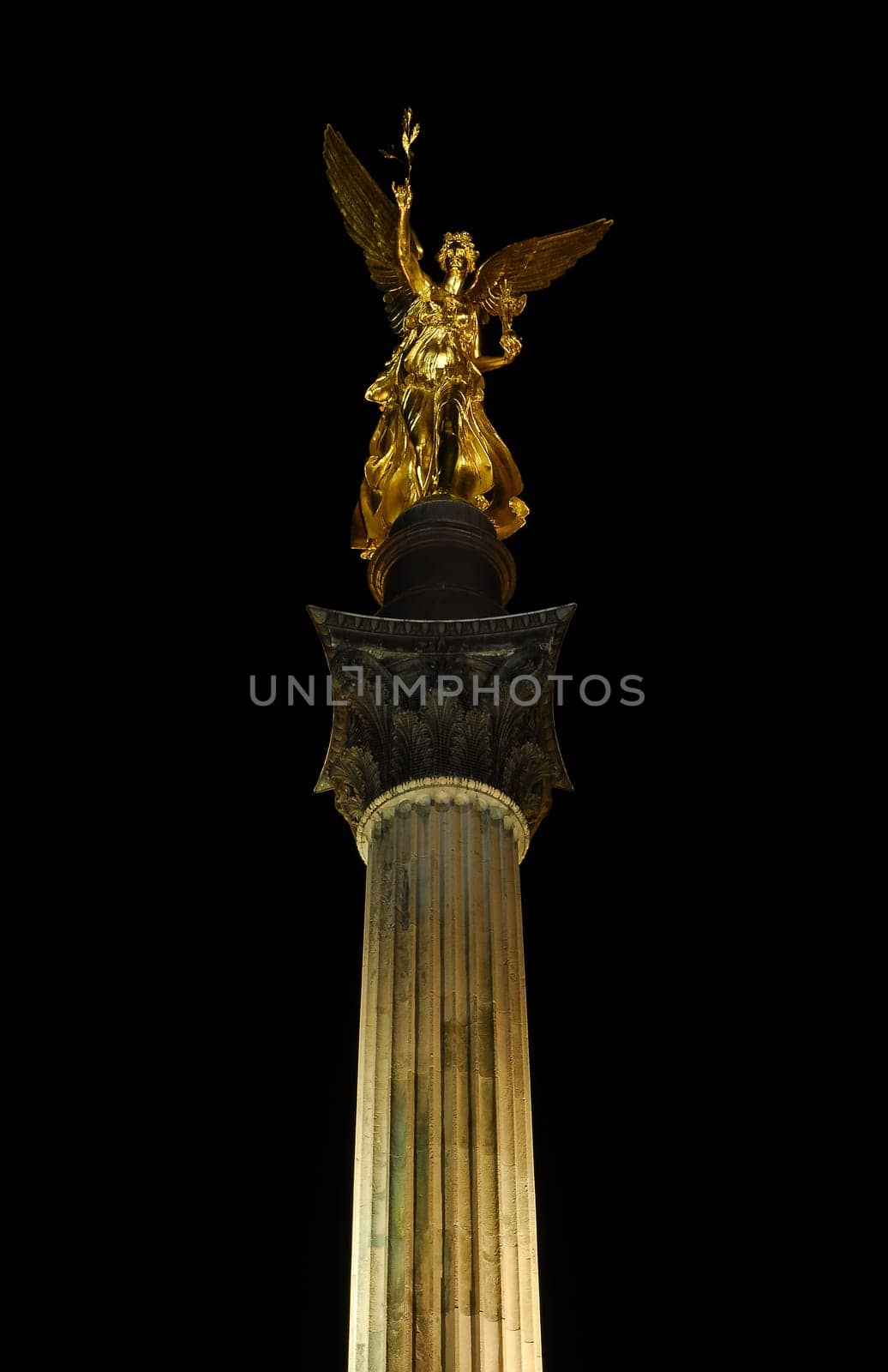 ... this photo is composed of two differently exposed shots: the angel with pedestal and the column with the entire sky... otherwise,overexposure of the brightly illuminated column would have been unavoidable...