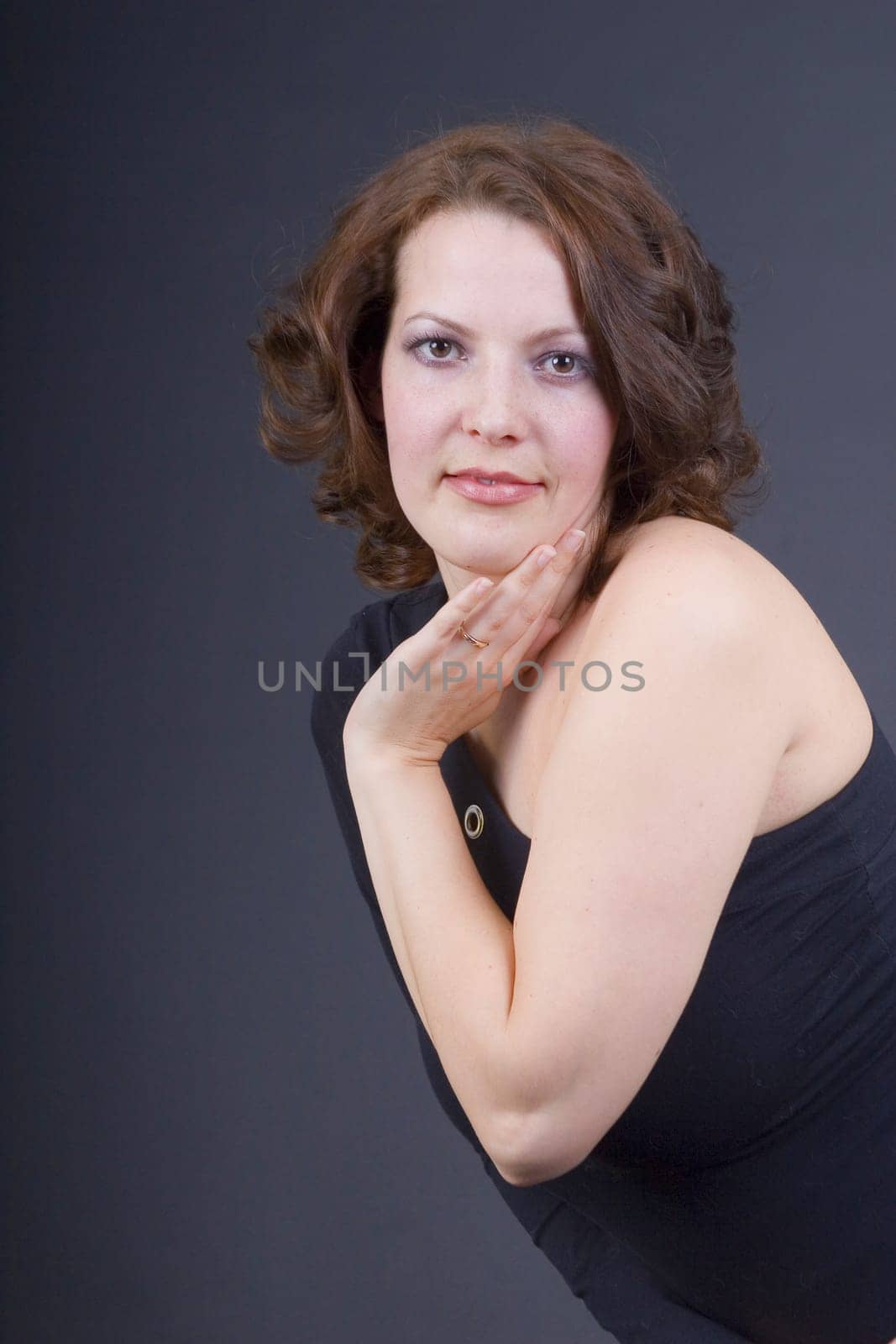 Angelique's hand on her chin