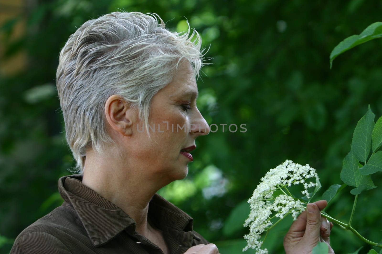 white-haired woman in her 50s