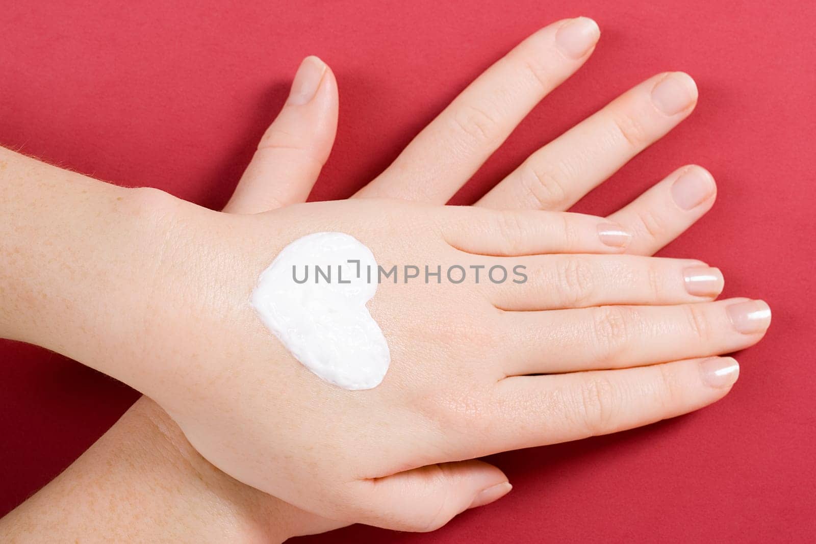 Cream heart on the back of the hand