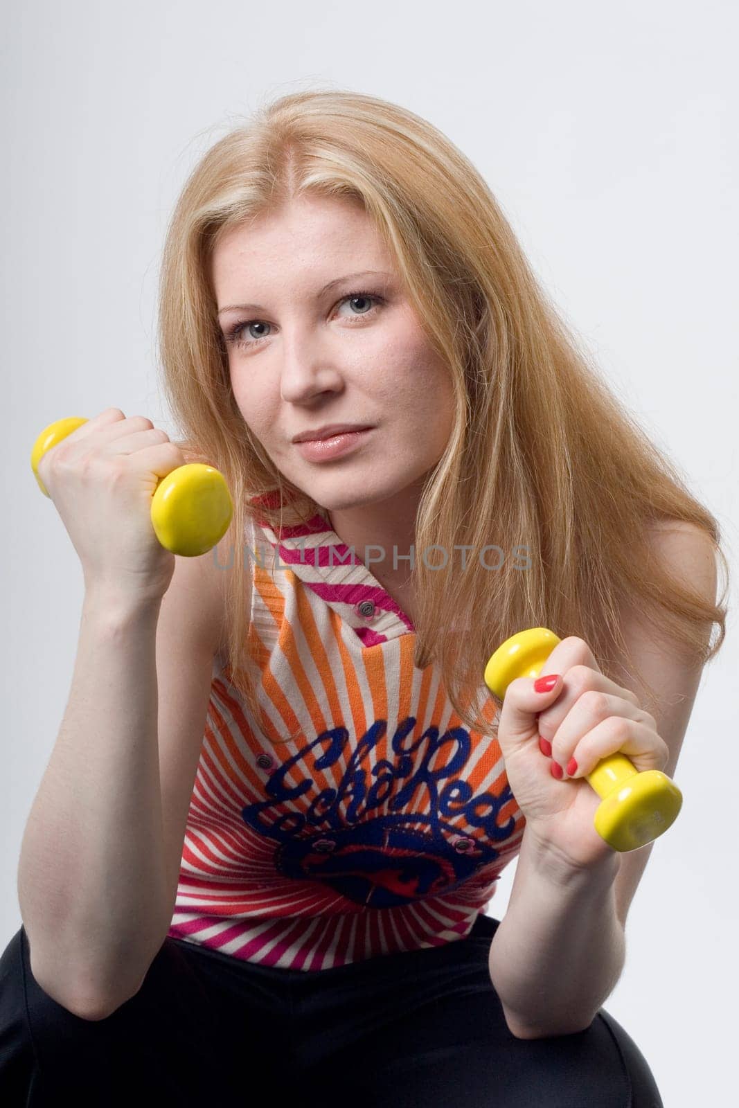 Franziska with dumbbells close up
