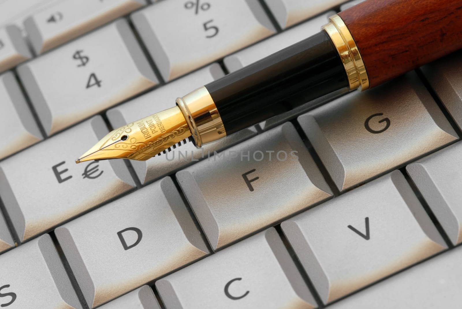 Pen rests on keyboard