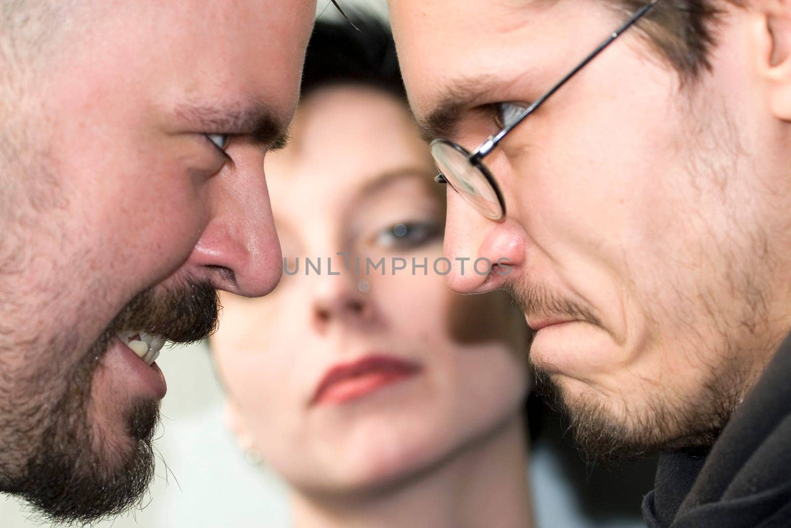 Two men vie for a woman