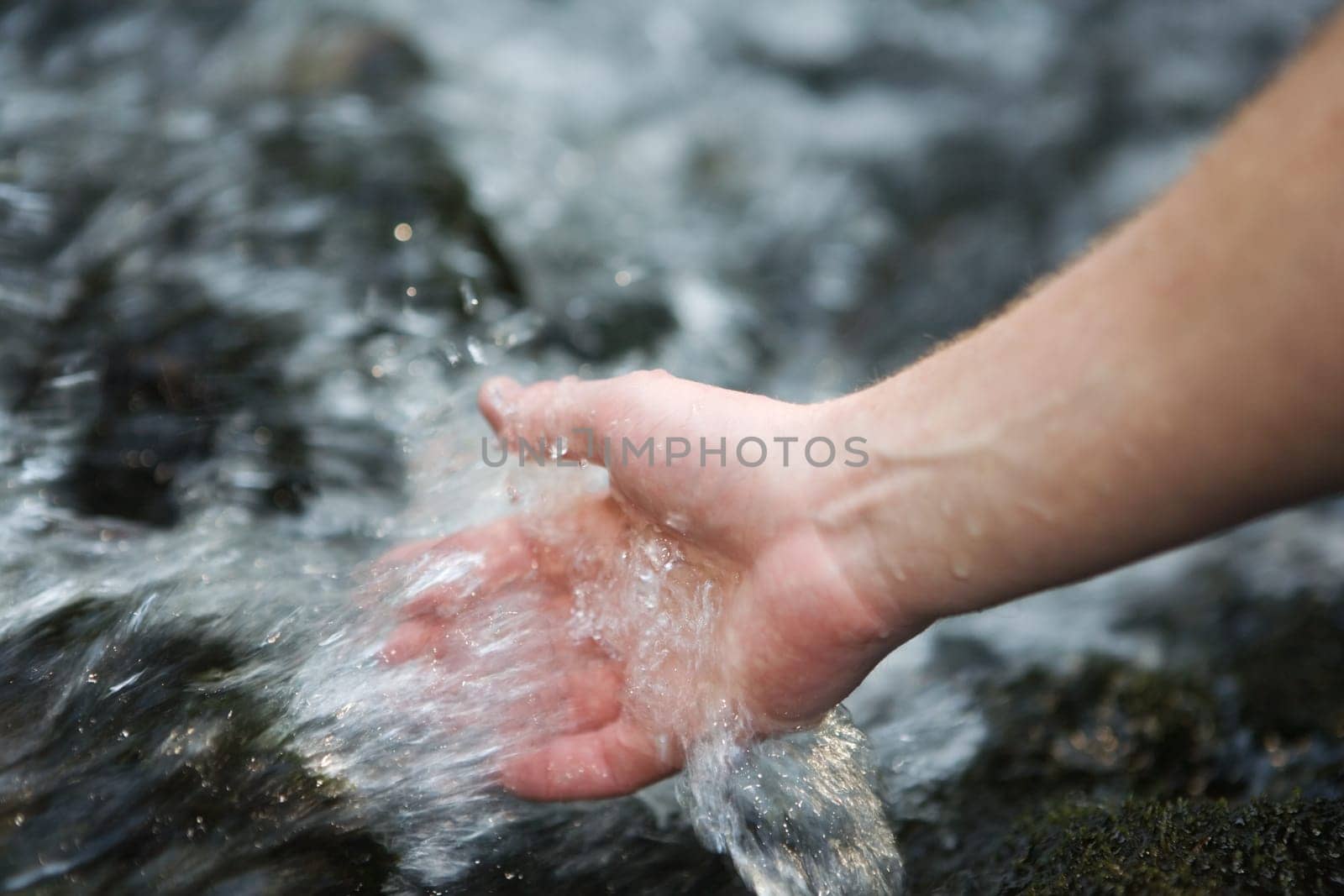 Hands in the water