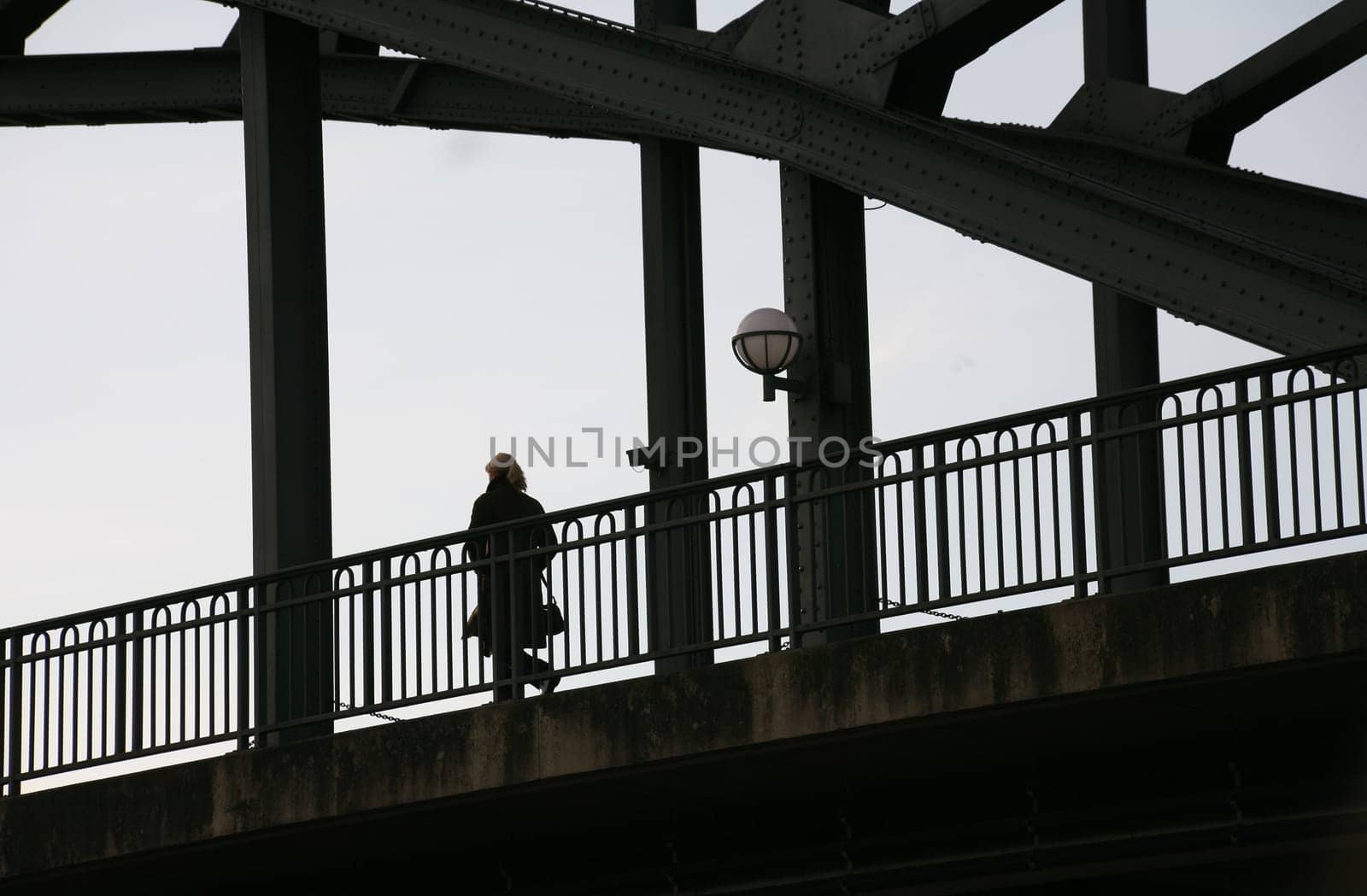 Woman on a bridge over the Weser