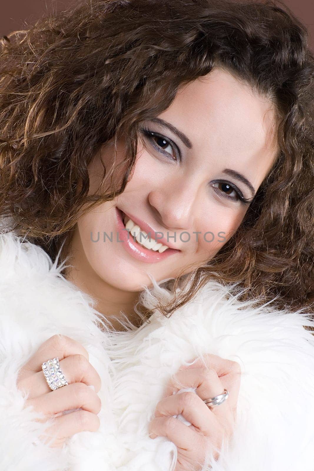 Woman with white fluffy coat collar