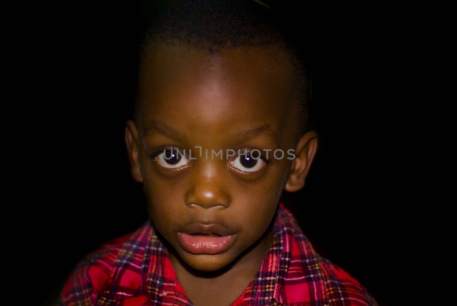Nathanael has - in my subjective opinion - the most beautiful eyes in Africa.....