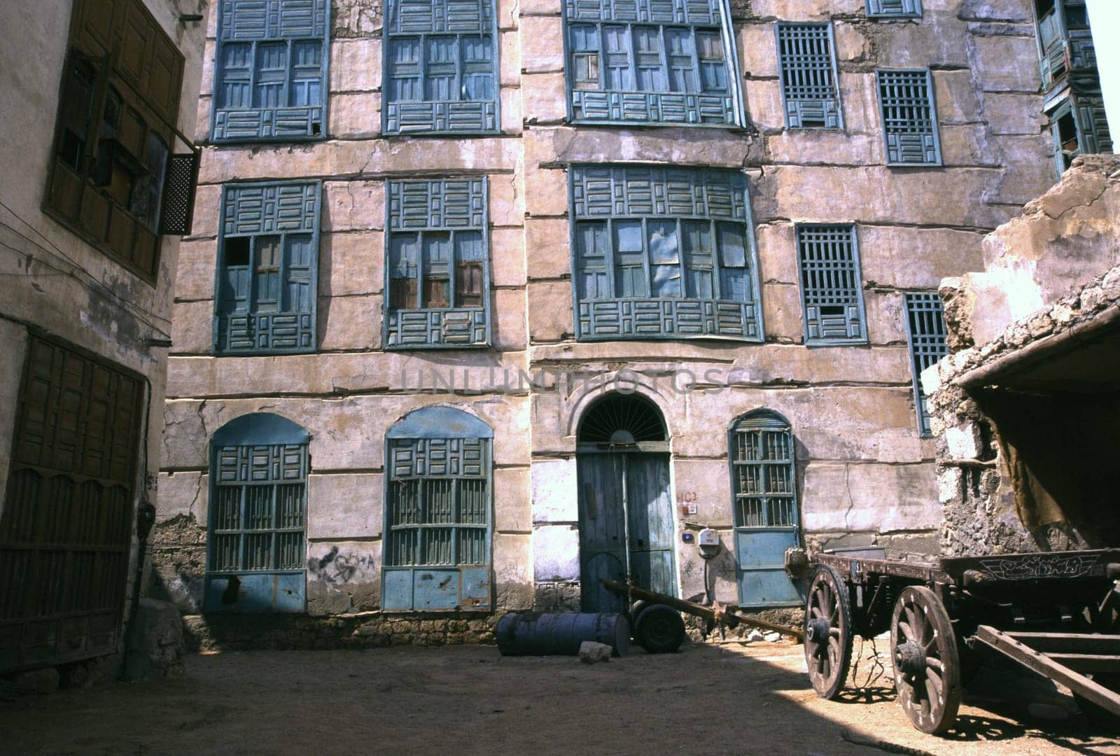 An old traditional house built of coral stone with wooden windows in the old town of Jeddah,Saudi Arabia.