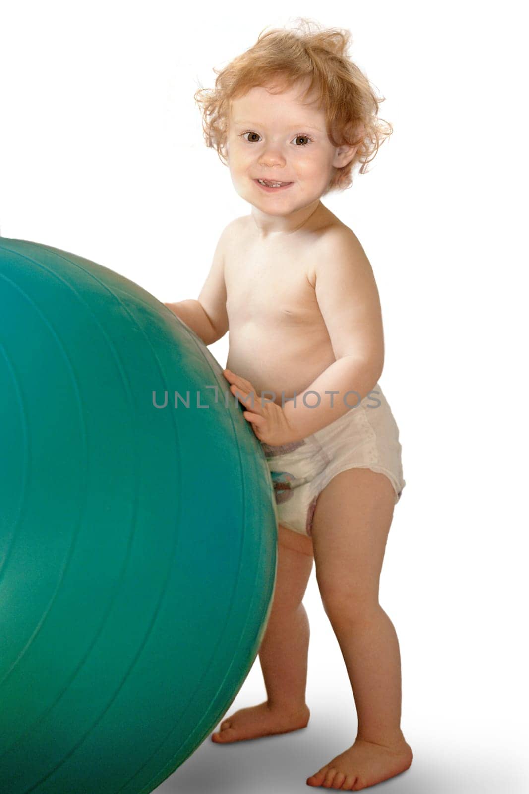 laughing baby with exercise ball