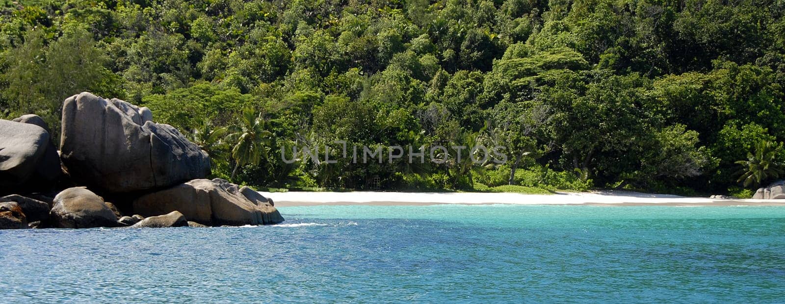 There is a small path in the north of the island that leads along the coast to Anse Georgette. However,this path is now almost completely overgrown and extremely difficult to find. By the way,the title is meant ironically  -) Almost