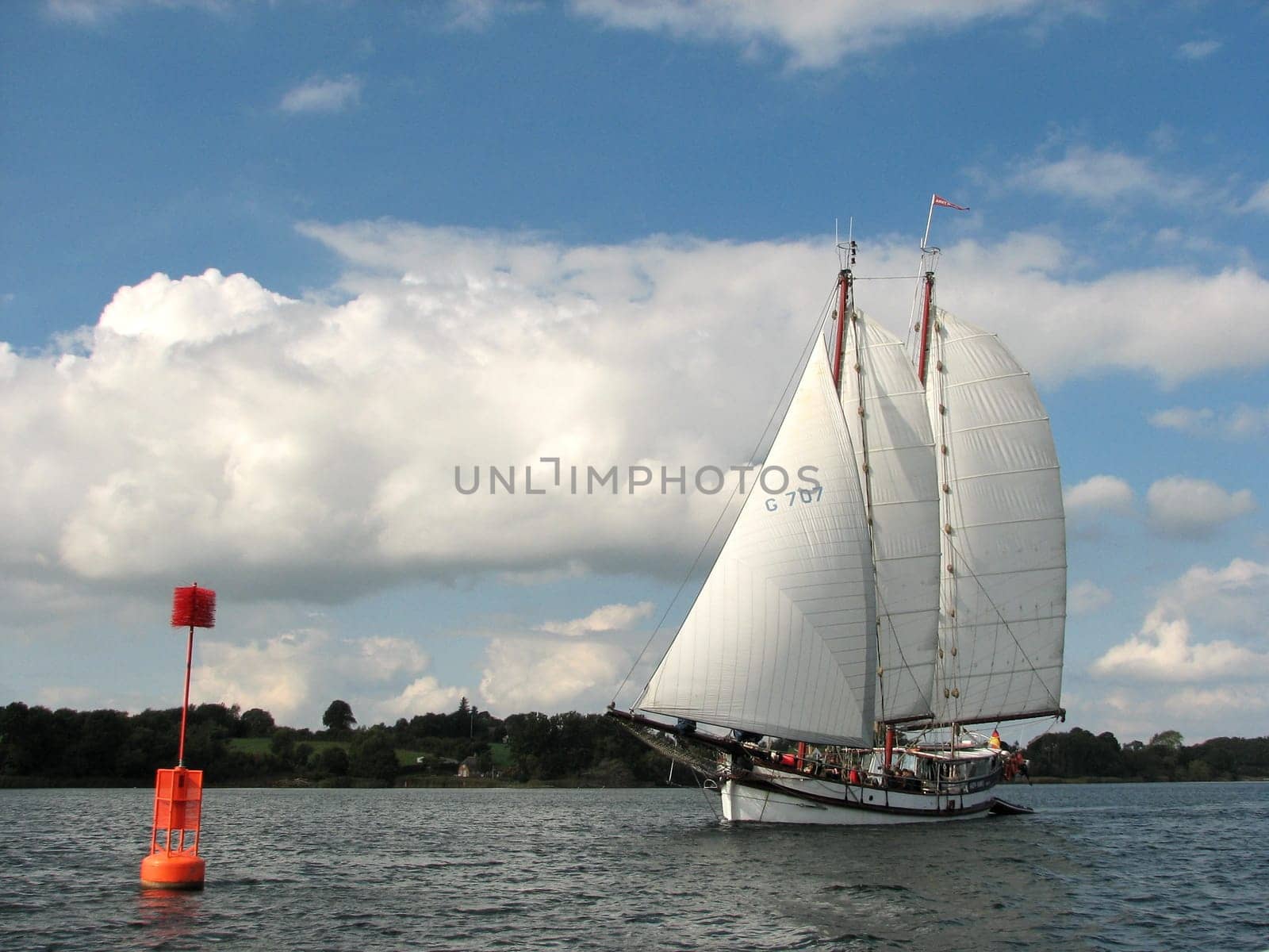 With full sails