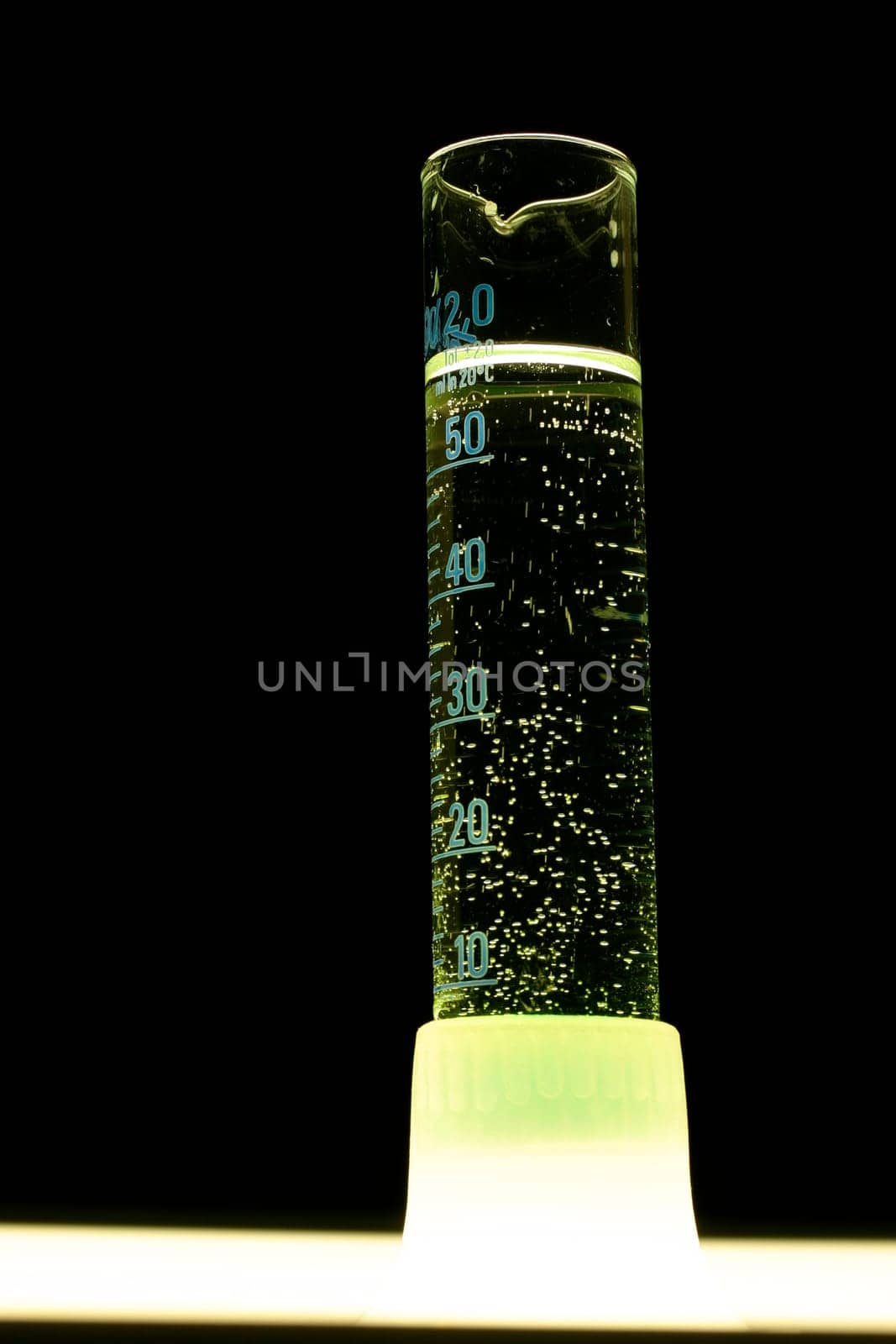 Measuring cylinder illuminated