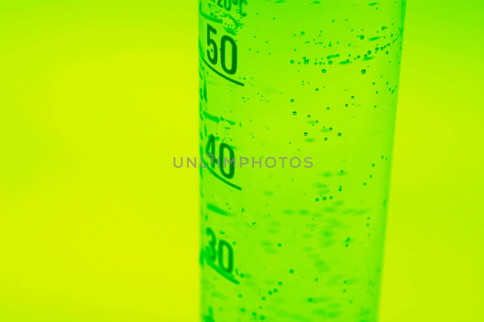 Green measuring cylinder