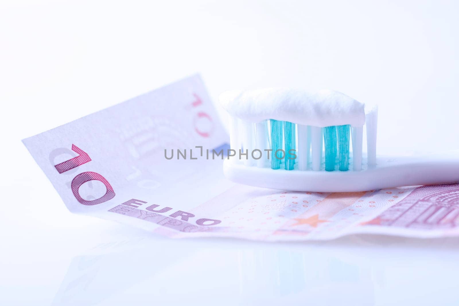 Toothbrush on banknote