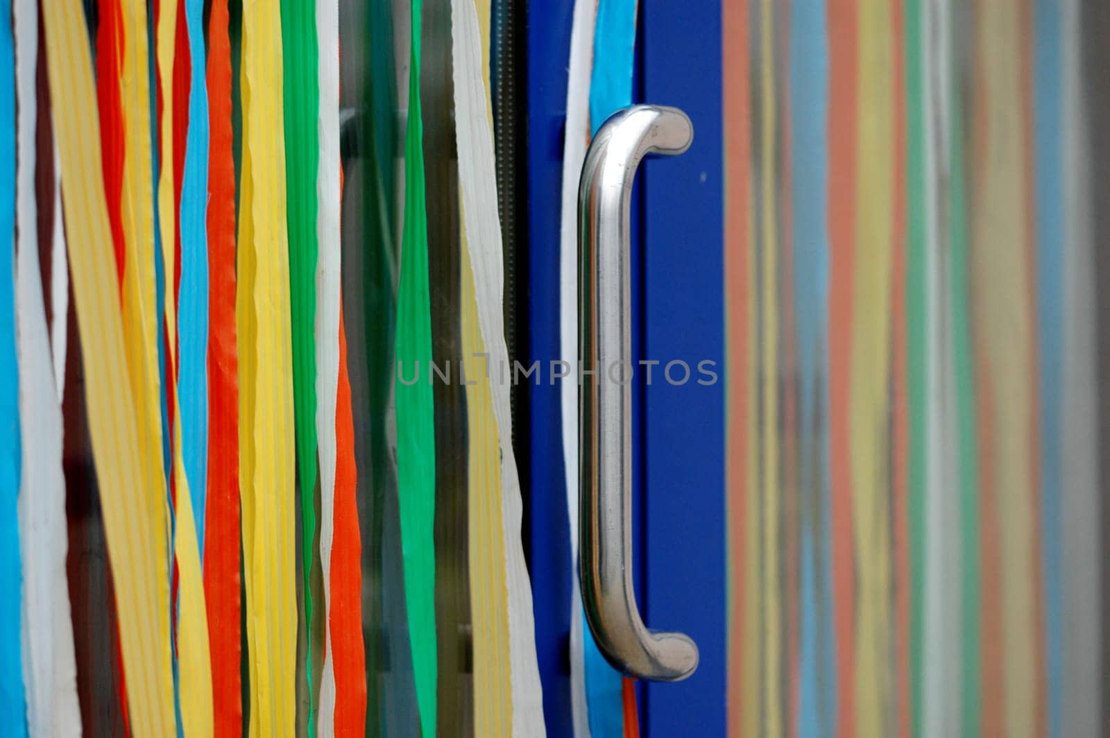 Door with colorful curtain