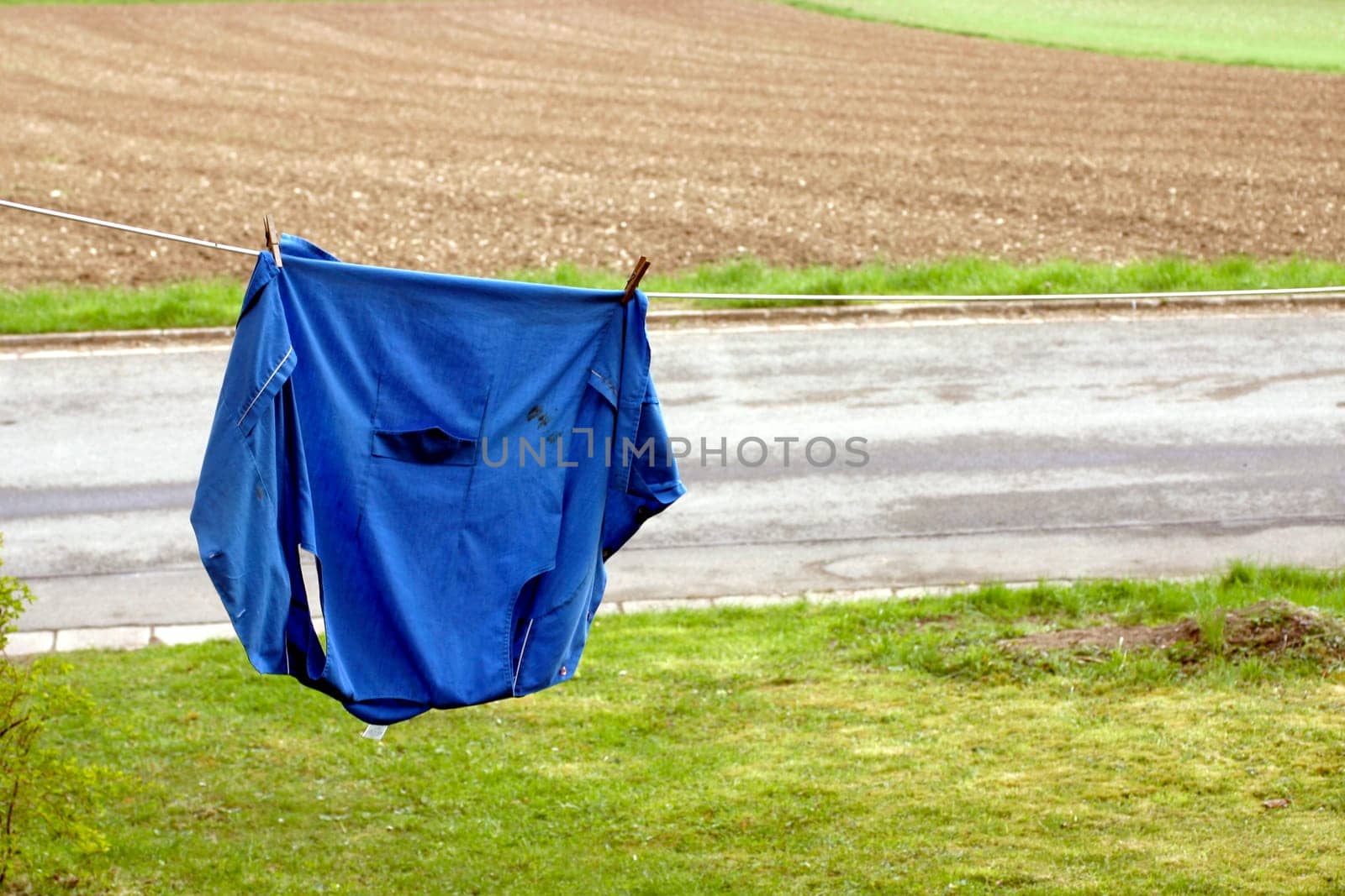 Shirt on clothesline,street