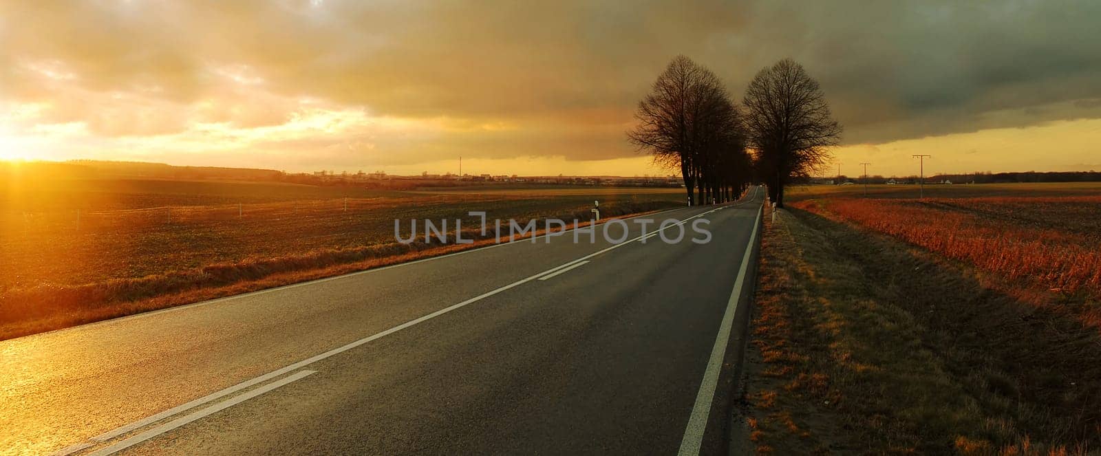 I tried again,after your hint,to cut the picture differently...! Thank you for that! But I'm not so sure if something can get away from the road in front!:-)