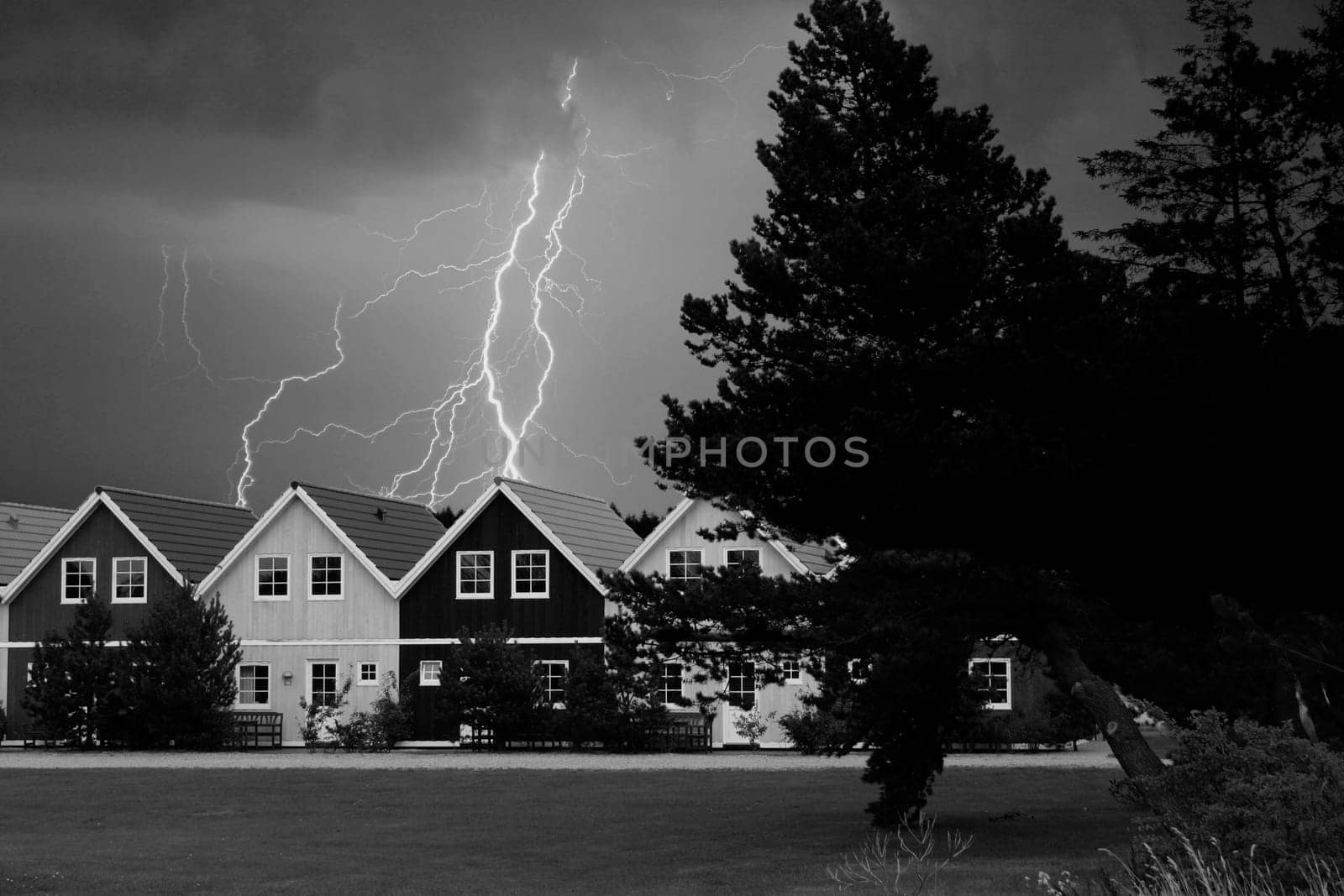 Houses with thunderstorms