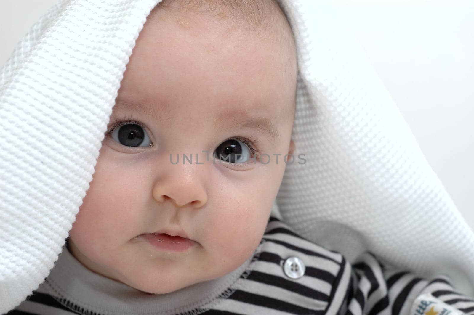 baby under the blanket
