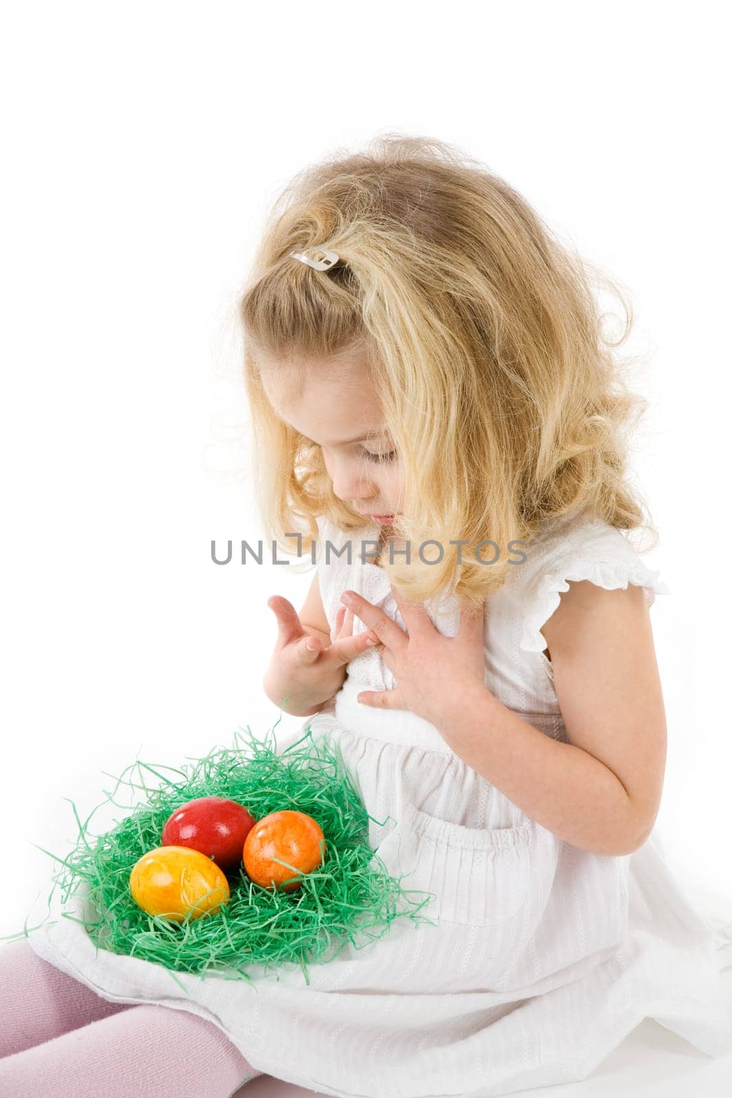 Girl with Easter eggs