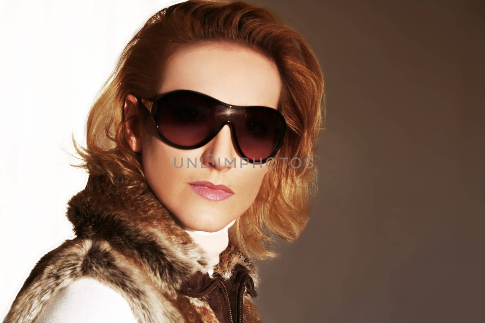 blonde woman with glasses