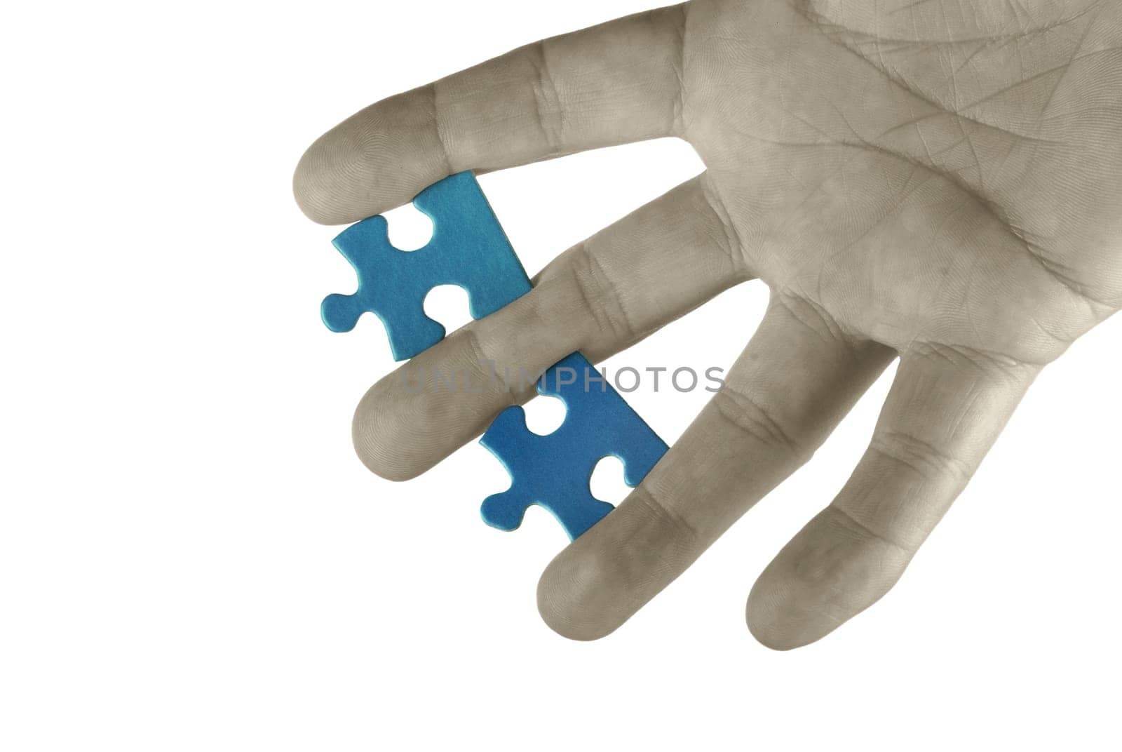 Hand with puzzle