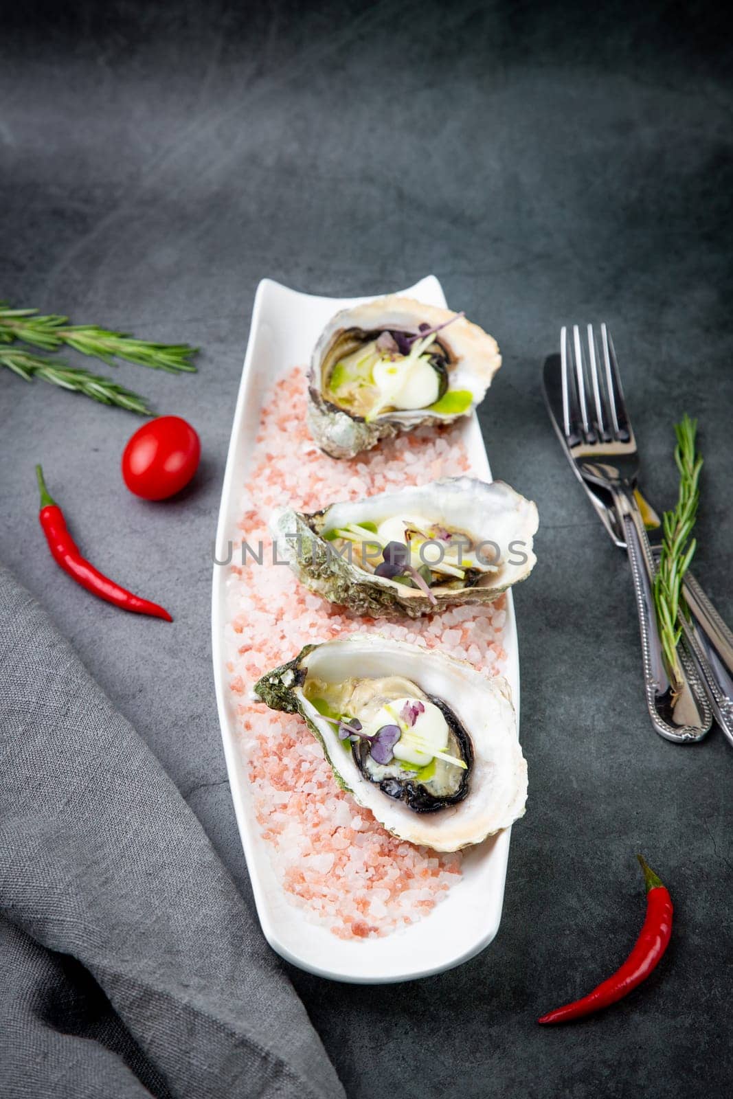 fresh oysters on red sea salt