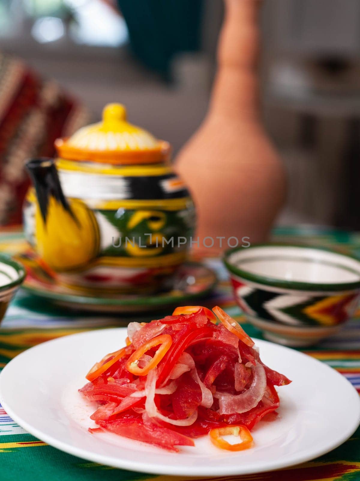 Salad of tomatoes and pickled onions according to the Uzbek recipe. Asian style. High quality photo