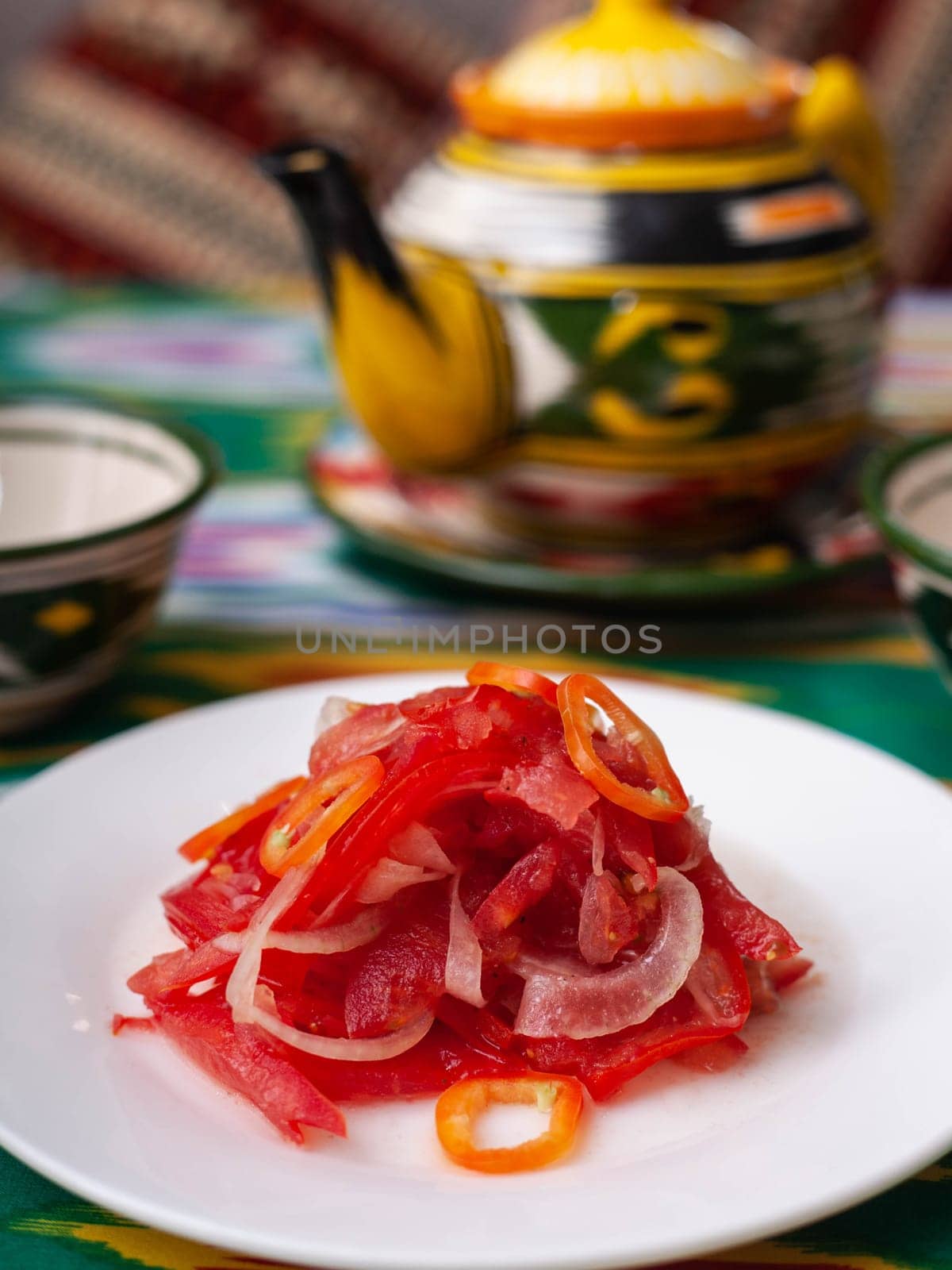 Salad of tomatoes and pickled onions according to the Uzbek recipe. Asian style. High quality photo